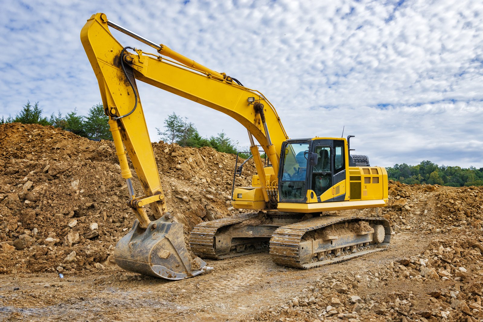 Excavator performing bulk earthworks